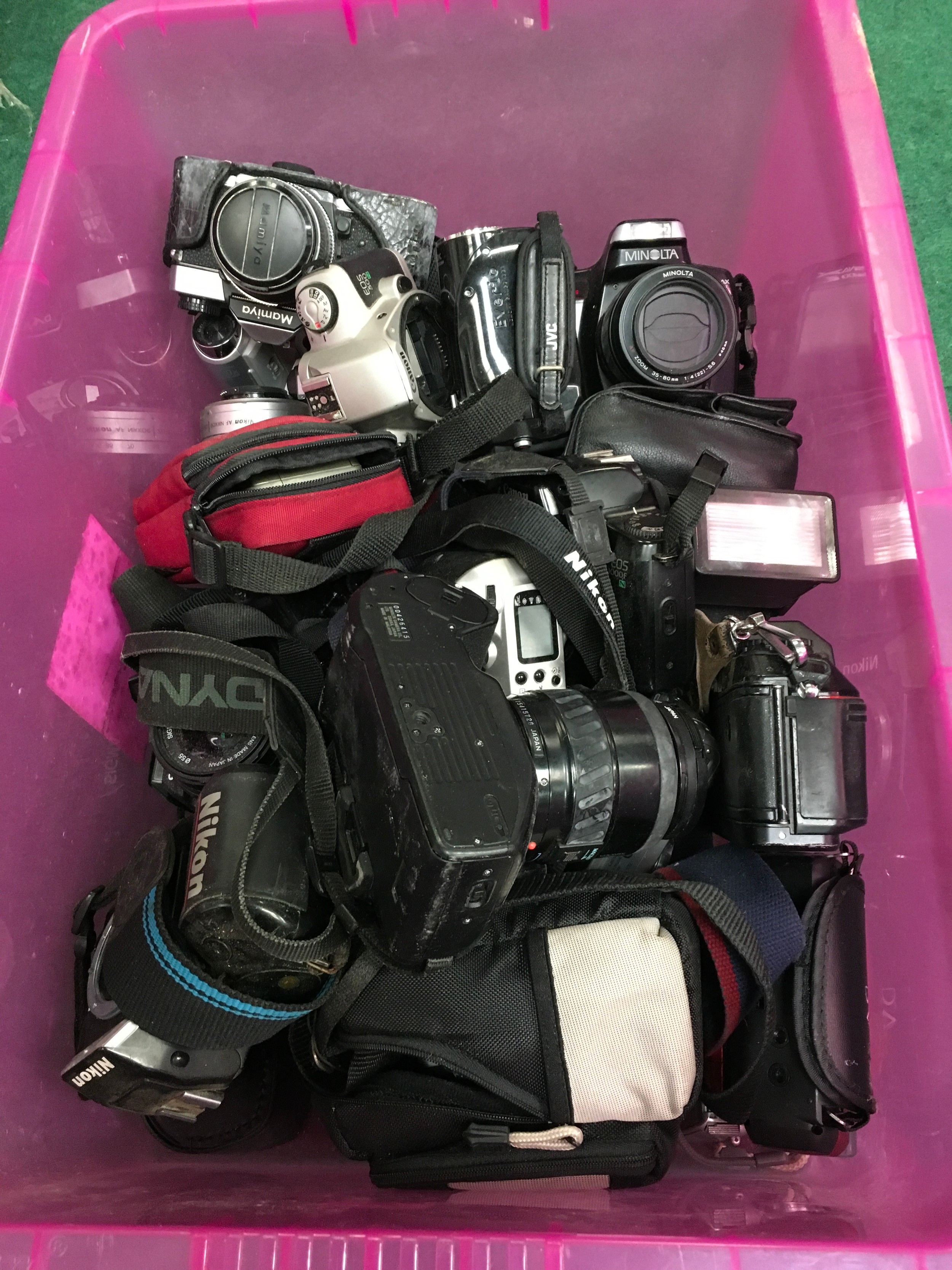 Tray of various cameras and accessories. Here we find makes to include - Olympus - Cannon -