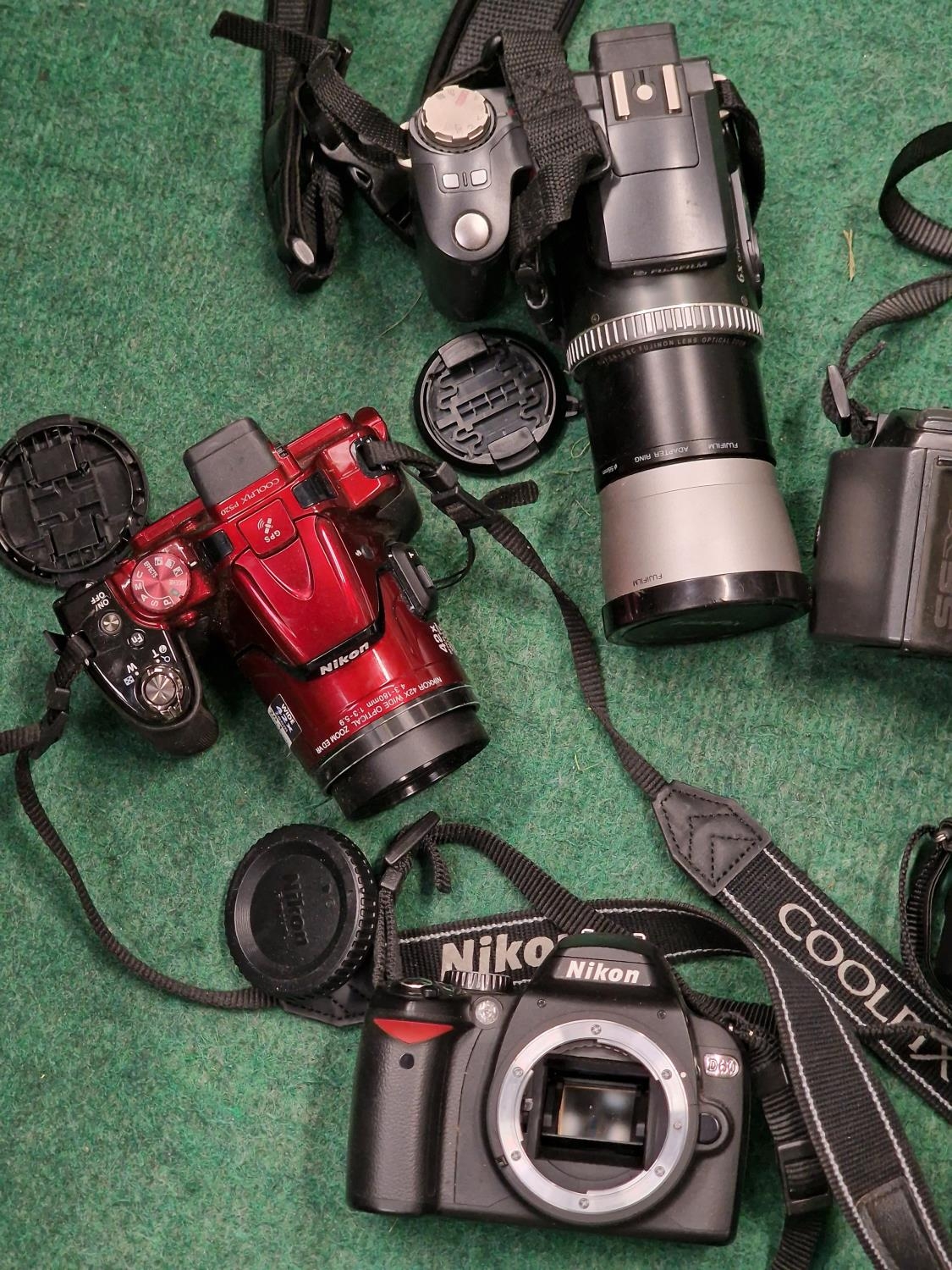 Selection OF 7 various cameras. Here we have makes - Nikon D60 -Sony DSC H300 - Sony Self 1650 - - Image 3 of 3