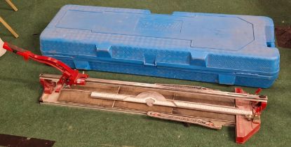 Ishii professional tile cutter with case.