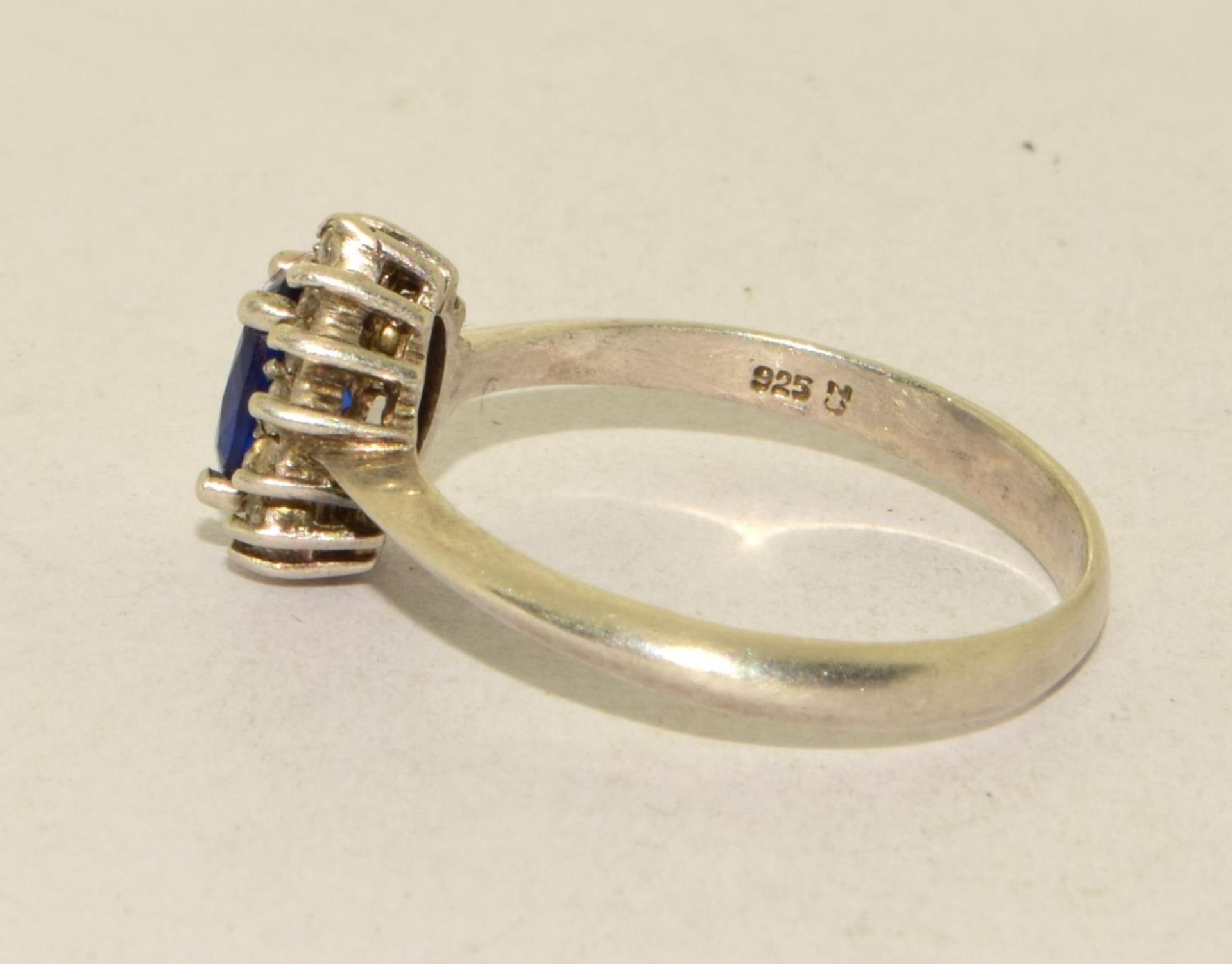 A 925 silver and sapphire cluster ring Size R 1/2. - Image 2 of 3