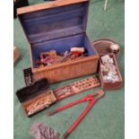 Large metal tin trunk containing a large collection of vintage hand tools.