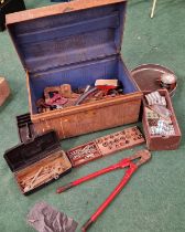 Large metal tin trunk containing a large collection of vintage hand tools.