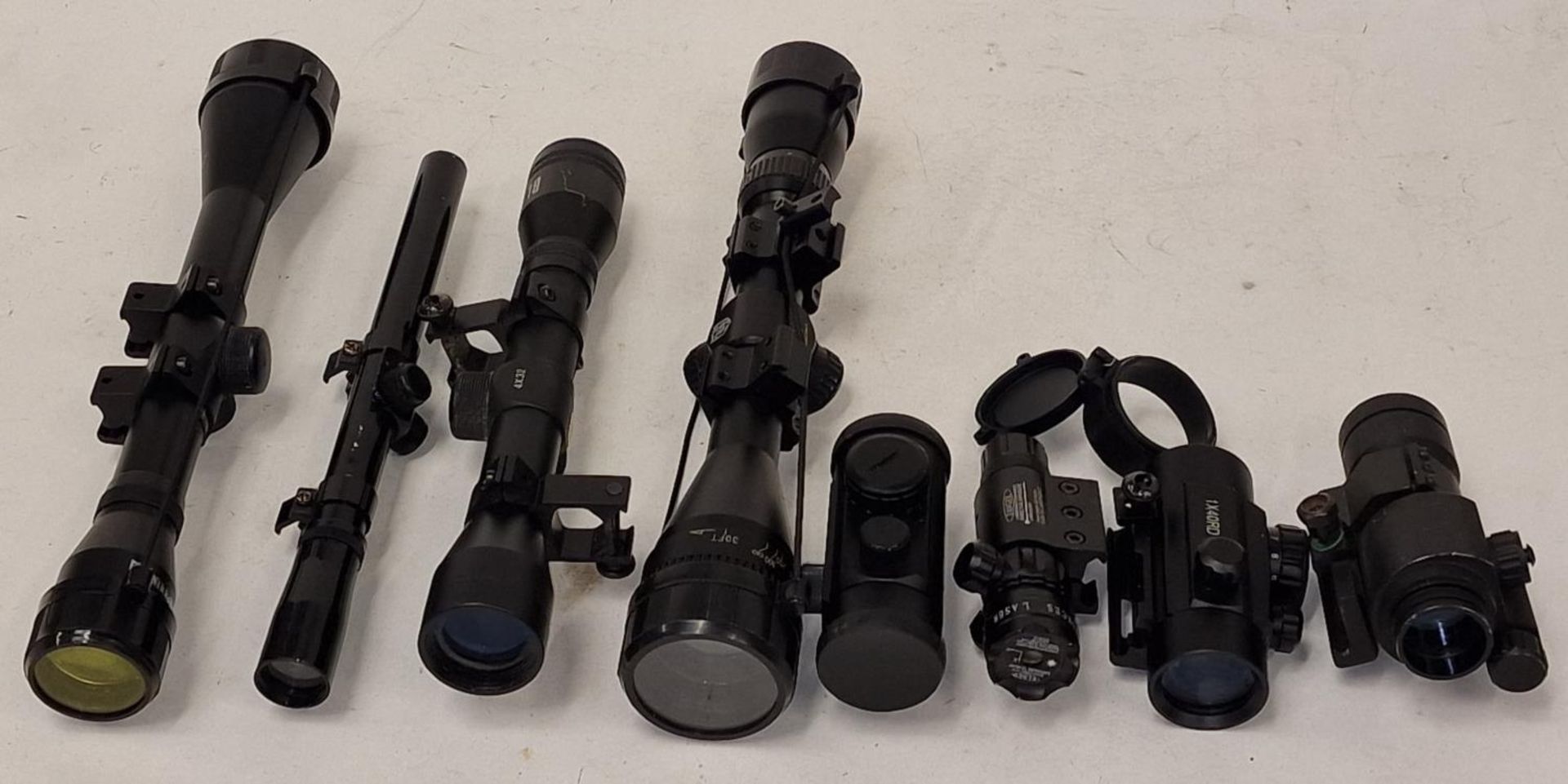 Collection of eight rifle scopes (REF 45, 44).