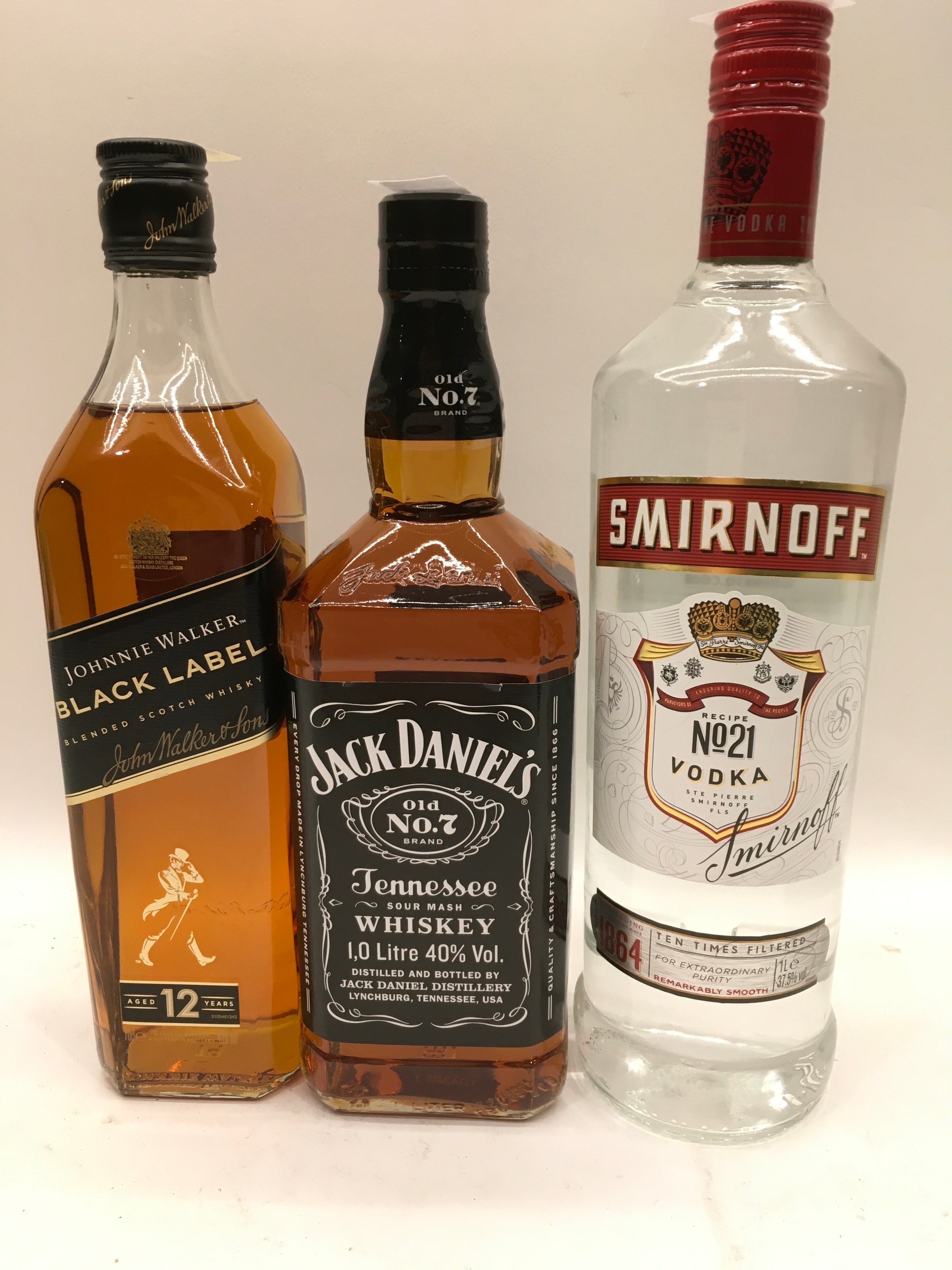 3 x bottles of alcohol 1ltr vodka, 1ltr Jack Daniels together another ref 227, 194, 210