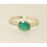 A 925 silver solitaire green stone ring Size P 1/2.