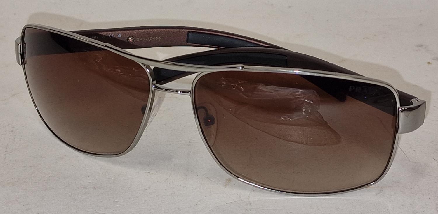Pair of Prada designer sunglasses (REF 253).