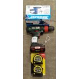Parkside cordless drill together with a Silverline boxed sander and some Stanley measuring tapes (
