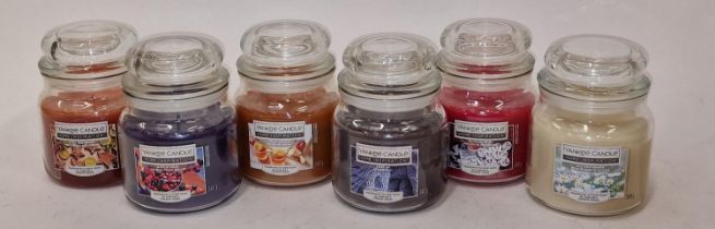 Six assorted Yankee candles (221)