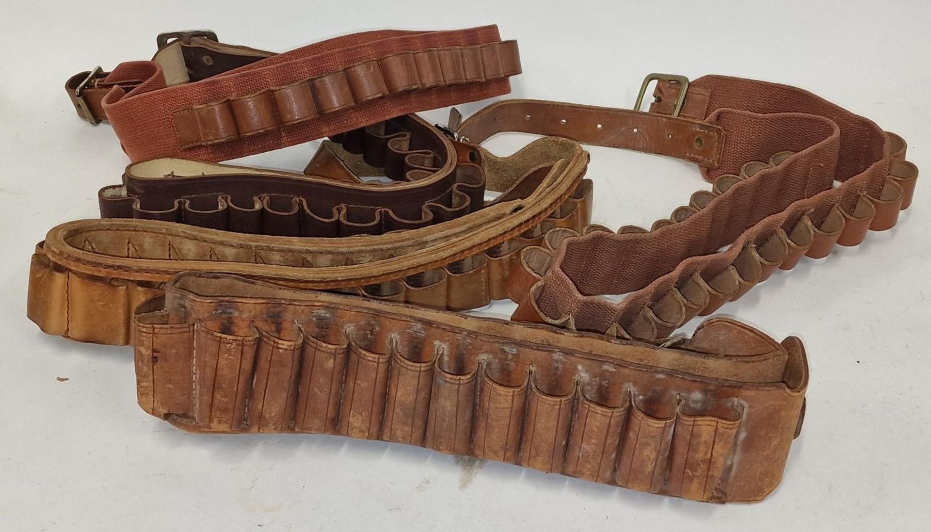Collection of leather ammunition belts. Five in total (REF 49).