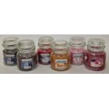 6 assorted Yankee candle. (225)