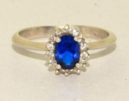 A 925 silver and sapphire cluster ring Size R 1/2.