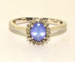 A 925 silver and lavender stone ring Size O