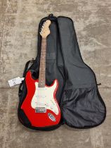 Red and white starter electric guitar with soft fabric carry case (REF 4).