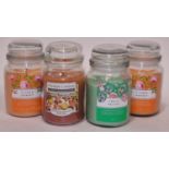 A large Yankee candle t/w 3 large jar candles. (268, 223)
