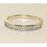 A w/g on 925 silver half eternity ring Size V