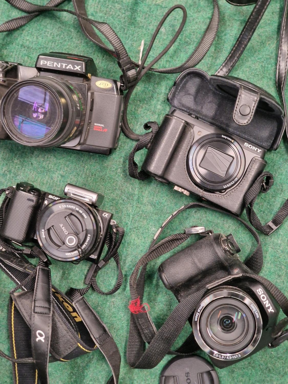 Selection OF 7 various cameras. Here we have makes - Nikon D60 -Sony DSC H300 - Sony Self 1650 - - Image 2 of 3