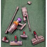 Dyson cordless hoover model No.U3G-UK-RKJ3171A. Come with various attachments and starts when