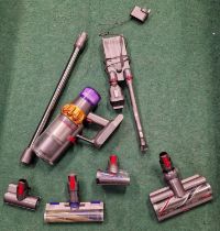 Dyson cordless hoover model No.U3G-UK-RKJ3171A. Come with various attachments and starts when