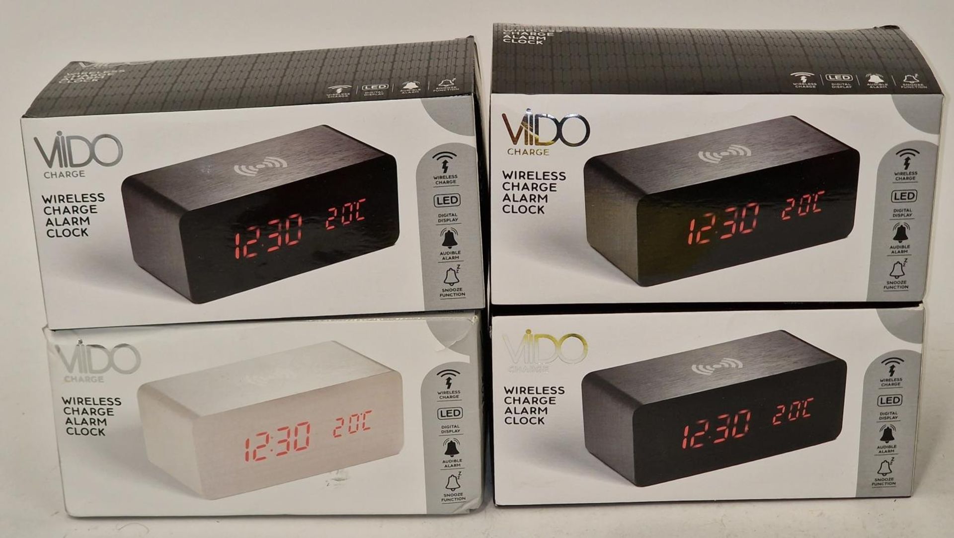 Four Vido Charge wireless charge alarm clocks boxed (REF 24).