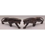 Pair of rare heavy wood carved tigers each 45cm long.