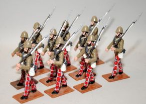 Britain's die-cast figures: late 19thC 72nd Highland Infantry marching in khaki blouse and trews. 10