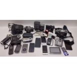 Collection of cameras, smartphones and other electricals.