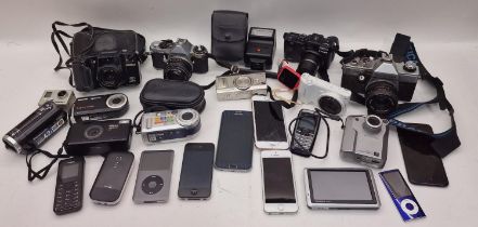 Collection of cameras, smartphones and other electricals.