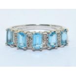 9ct white gold Emerald cut Blue Topaz and Diamond ring 3g size N