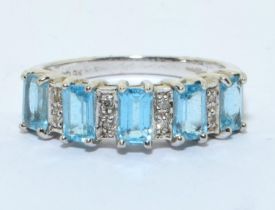 9ct white gold Emerald cut Blue Topaz and Diamond ring 3g size N