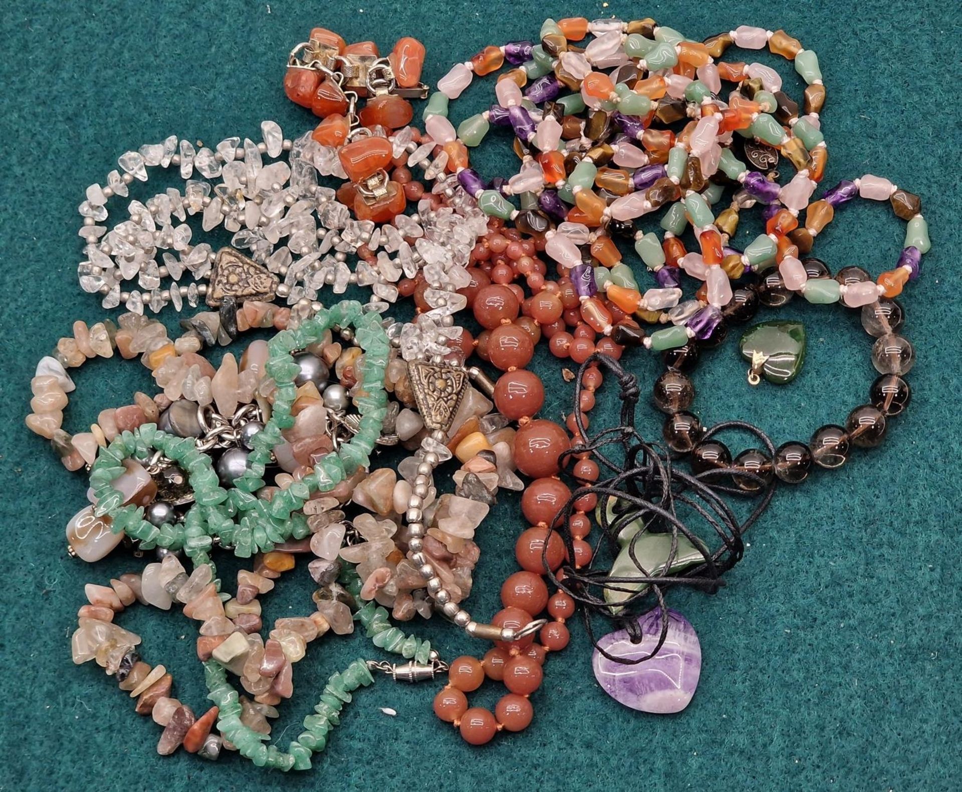 Collection of natural agate necklaces and bracelets