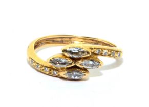 Diamond snake style ring with 4 marquise cut diamonds with diamond shoulders set in a tested 18ct