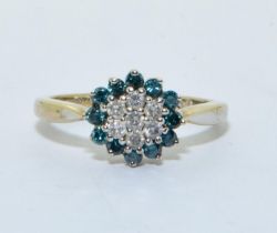 Daisy ring with Diamond center and outer ring of Blue stones in 9ct gold size K