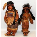 Two vintage dolls in Native American Indian dress approx 40cms tall