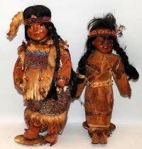 Two vintage dolls in Native American Indian dress approx 40cms tall