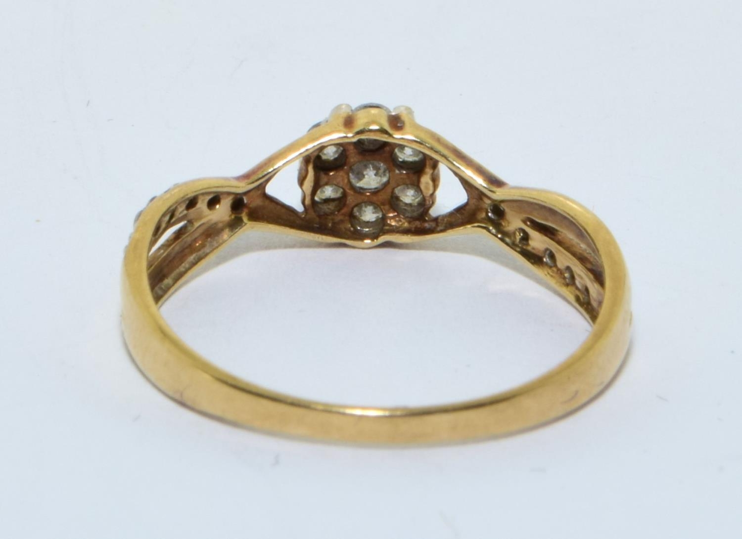 9ct gold Diamond cluster ring with Diamonds to the shank hall marked as 0.25ct size N - Image 3 of 5