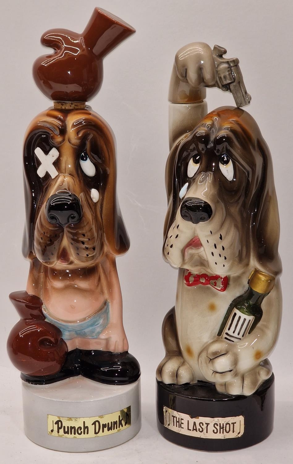 Two vintage 1960's musical novelty decanters "The Last Shot" and "Punch Drunk". Both still play