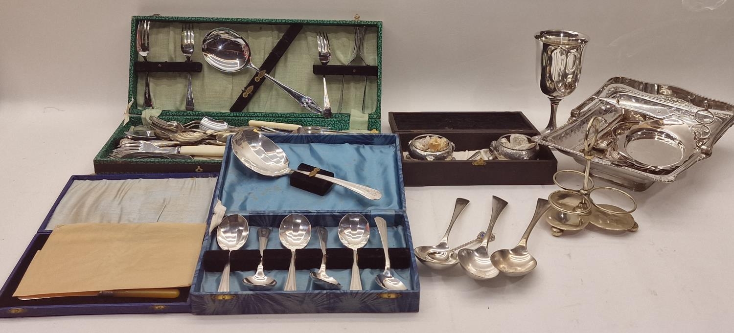 A collection of silver plated items to include boxed flatware sets.