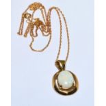 9ct gold Opal pendant necklace in a claw setting with a chain of 46cm