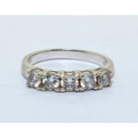 A 925 silver and CZ five stone ring Size M