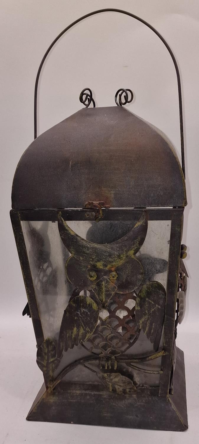 Vintage rustic metal and glass lantern depicting owls 46cm tall excluding handle.