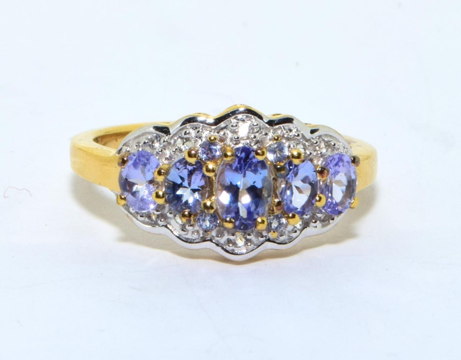 A stunning gold on 925 silver and tanzanite ring, Size P