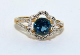 9ct gold Blue Topaz and Diamond halo design ring size N