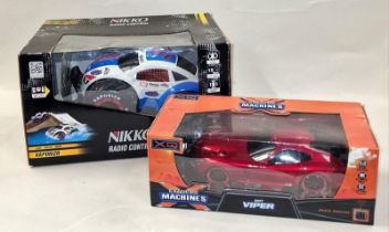 Nikko radio control vaporizr boxed car together with a boxed Extreme Machines SRT Viper car (2).
