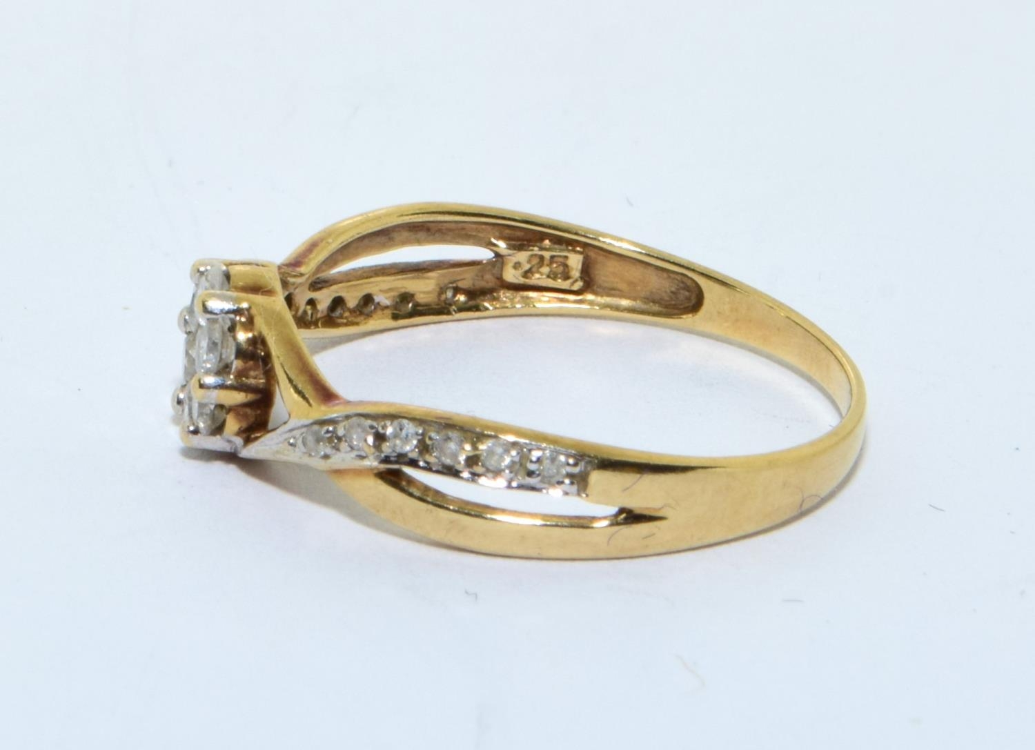 9ct gold Diamond cluster ring with Diamonds to the shank hall marked as 0.25ct size N - Image 2 of 5