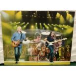 RUSH ‘TIME MACHINE’ TOUR PRINTED PHOTO. This is a printed photo of Neil Pearl who was drummer that