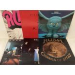 COLLECTION OF 6 RUSH VINYL LP RECORDS. Titles here are as follows - Caress Of Steel - Power