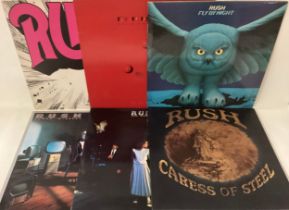 COLLECTION OF 6 RUSH VINYL LP RECORDS. Titles here are as follows - Caress Of Steel - Power