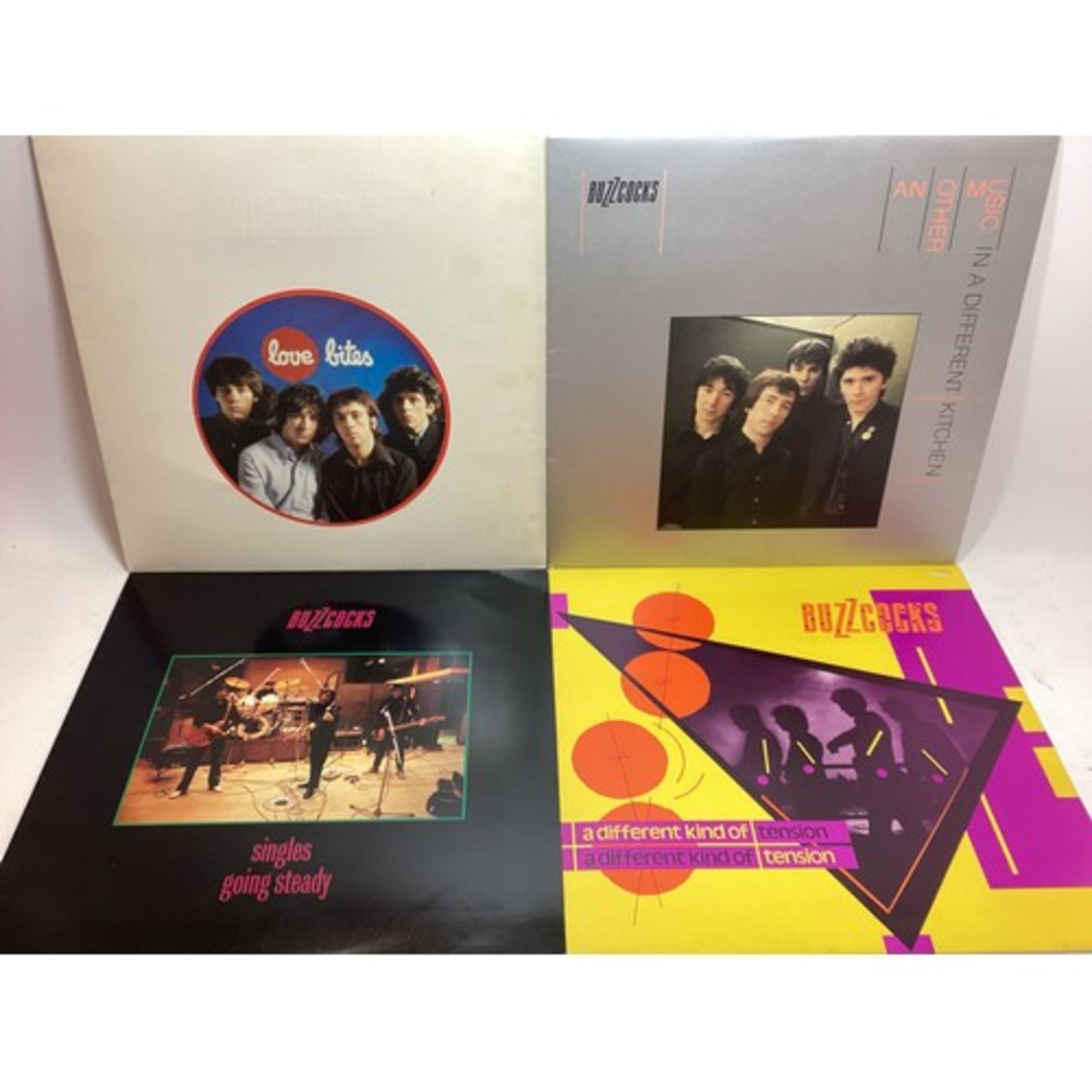 SELECTION OF 4 BUZZCOCKS VINYL LP RECORDS.