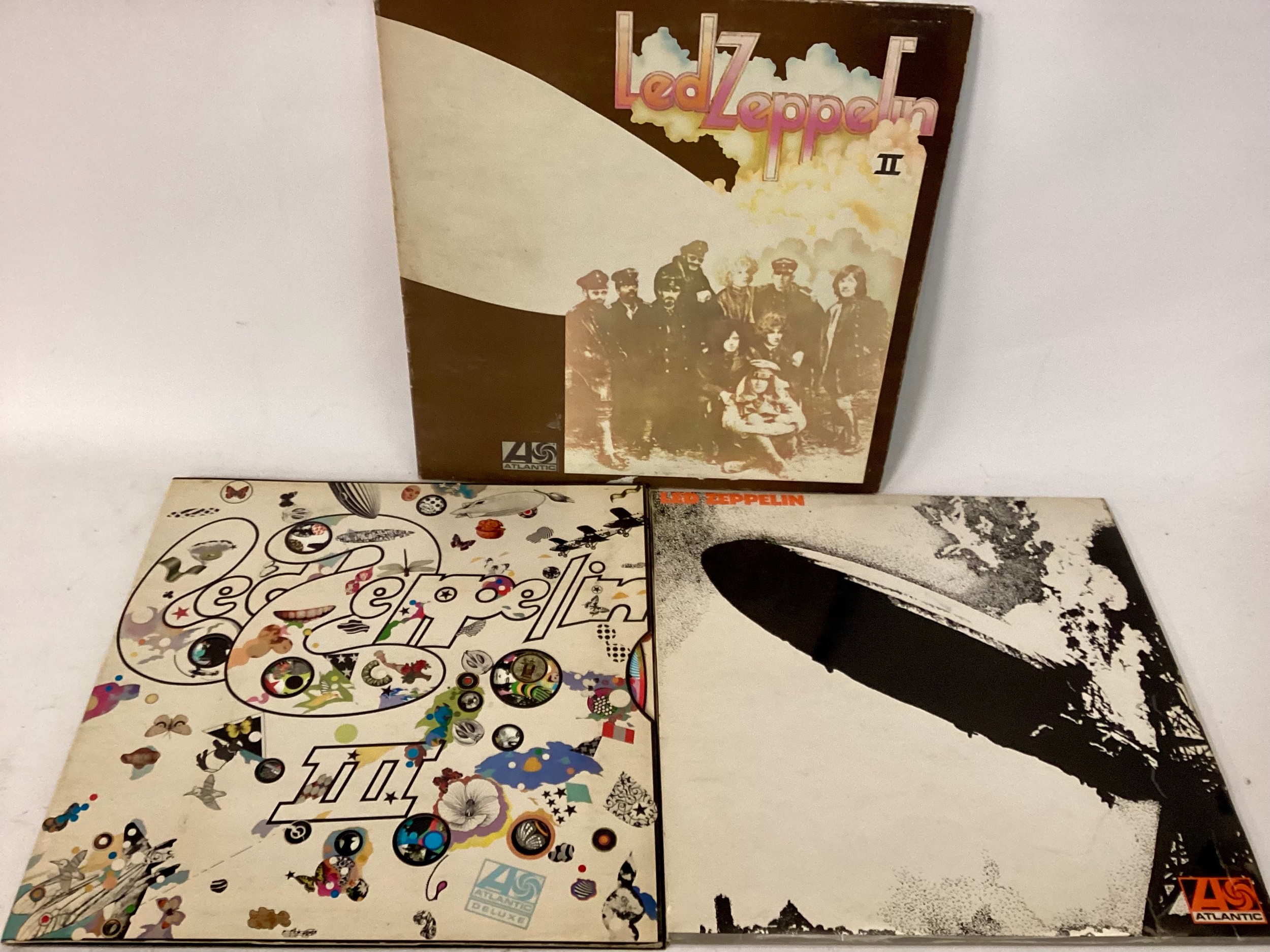 LED ZEPPELIN 1 / 2 & 3 PLUM LABEL VINYL ALBUMS. First we have a copy of their first album On