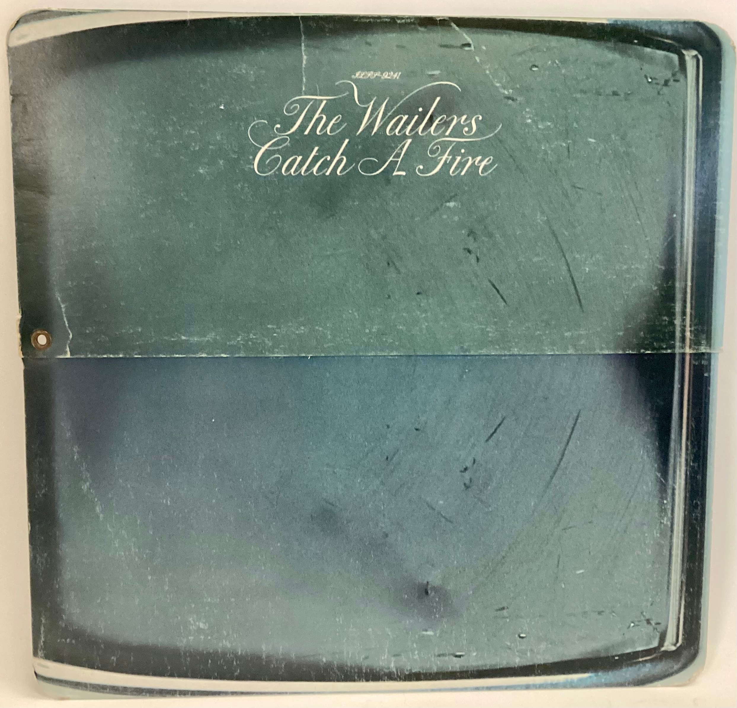 BOB MARLEY AND THE WAILERS LP ‘CATCH A FIRE’ IN RARE ZIPPO LIGHTER SLEEVE. From 1973 on Island